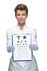 Image showing young woman ophthalmologist with eye chart