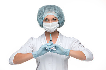 Image showing Portrait of lady surgeon showing syringe over white background