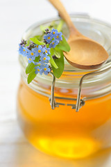 Image showing glass jar full of honey