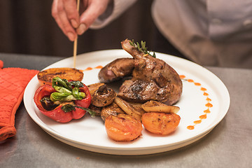 Image showing grilled duck legs