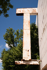 Image showing Home Furnishings Retail Store Sign Downtown Faded Away