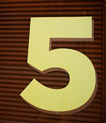 Image showing Number 5 Five Fifth Floor Parking Garage Yellow Rusted Wall