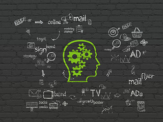 Image showing Marketing concept: Head With Gears on wall background