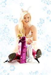 Image showing happy bunny girl with snowflakes