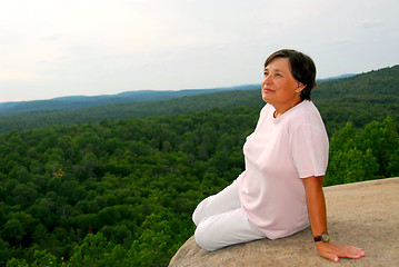 Image showing Woman edge cliff