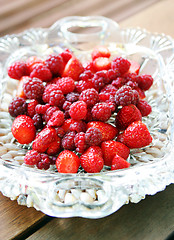 Image showing Raspberries and strawberries