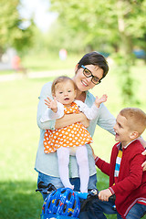 Image showing happy young family in park