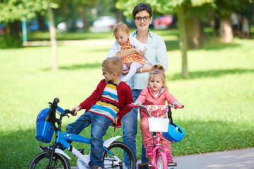 Image showing happy young family in park