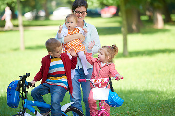 Image showing happy young family in park