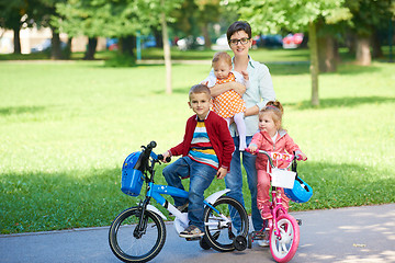 Image showing happy young family in park