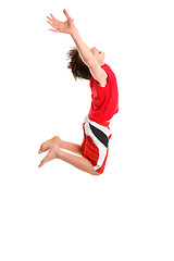 Image showing Leaping child hands stretched to sky