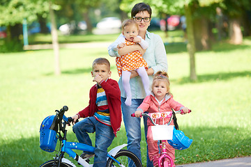 Image showing happy young family in park