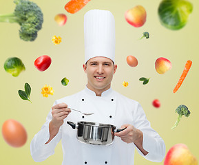 Image showing happy male chef cook with pot and spoon