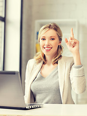 Image showing woman with laptop and finger up