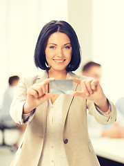 Image showing businesswoman showing credit card