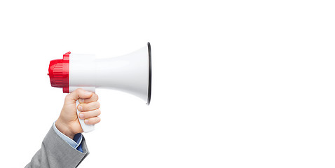 Image showing businessman in suit speaking to megaphone