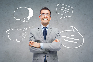 Image showing happy smiling businessman in eyeglasses and suit