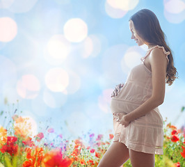 Image showing happy pregnant woman in chemise