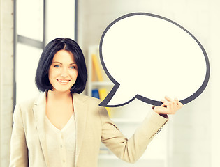 Image showing smiling businesswoman with blank text bubble