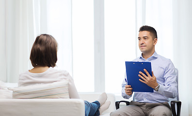 Image showing doctor and young woman meeting at home visit