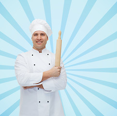 Image showing happy male chef cook holding rolling pin