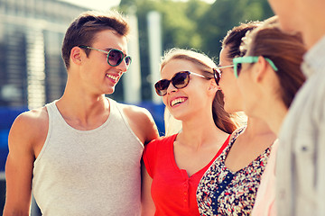 Image showing group of smiling friends in city