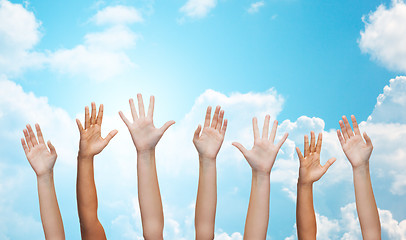Image showing people waving hands