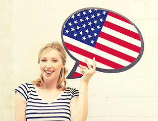 Image showing smiling woman with text bubble of american flag