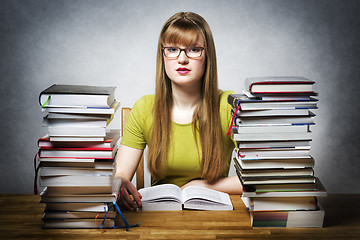 Image showing young woman is reading book