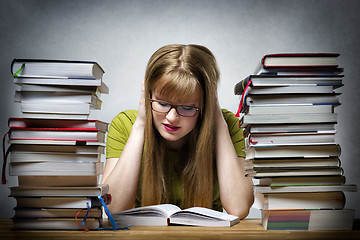 Image showing young woman is reading book