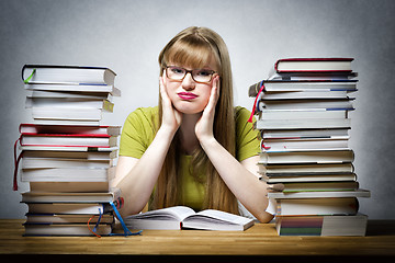 Image showing young woman is reading book