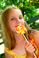 Image showing Girl with lollipop