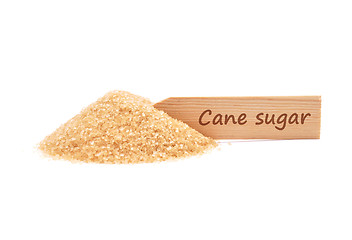 Image showing Brown cane sugar at plate