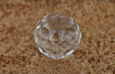 Image showing Crystal ball on sand