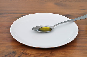 Image showing Olive oil on spoon