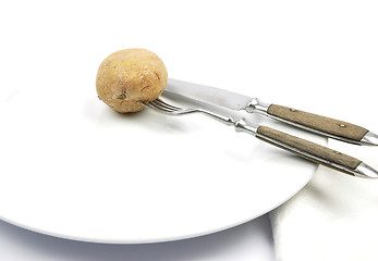 Image showing Potato with peel on table