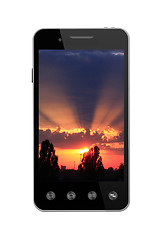 Image showing smart-phone with picture of sunset on white