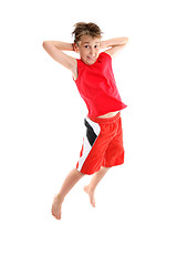 Image showing Boy jumping hands behind head