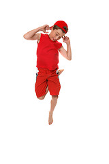 Image showing Funny face boy hopping