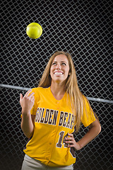 Image showing Female Softball Player Portrait with Ball in the Air.