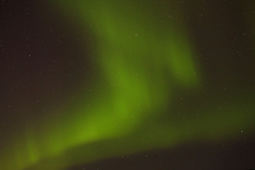 Image showing Dynamic aurora with bright stars in Iceland