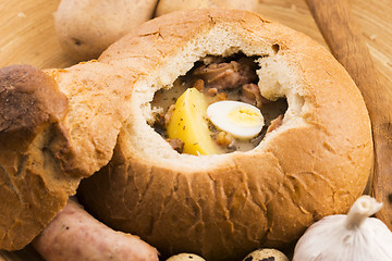 Image showing traditional white borscht (zurek) with sausage,egg and mushrooms