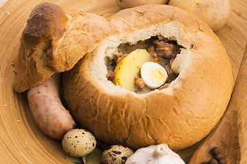 Image showing traditional white borscht (zurek) with sausage,egg and mushrooms