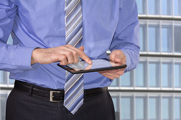 Image showing Businessman with tablet