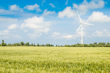 Image showing Summer landscape with wind generators  