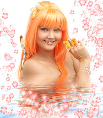 Image showing butterfly girl in water with flowers #2