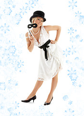 Image showing pretty lady with black mask and snowflakes