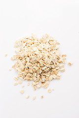 Image showing Oat flakes pile on white background