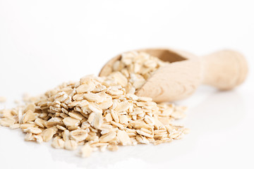 Image showing Oat flakes pile on white background