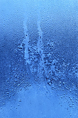 Image showing Frozen water drops on glass